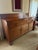 Description: Elegant antique sideboard with solid wood construction (likely mahogany or walnut). Features 3 upper drawers...