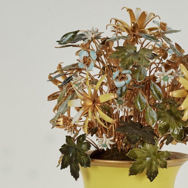 Delightful vintage Italian floral arrangement crafted with brass flowers decorated in enamel and presented in an alluring...