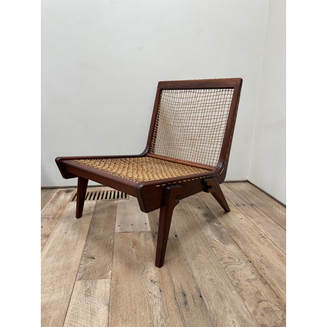 Lounge chairs beautifully crafted in solid wood with hand spun ixtl rope laced through the seat and back rest....