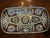 This is an oblong tray with rounded edges made of lead crystal. It is of molded glass, not cut or etched. The 12” length...