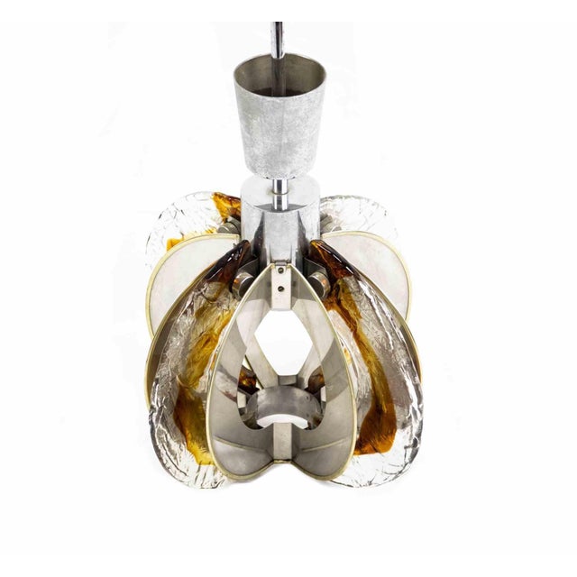 La Luce Roma chandelier is an original decorative object realized in the 1970s. A vintage Italian handmade chandelier...