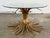 Statement vintage Mid-Century Coco Chanel Hollywood Regency style gilt metal sheaf of wheat table. Gorgeous piece that...