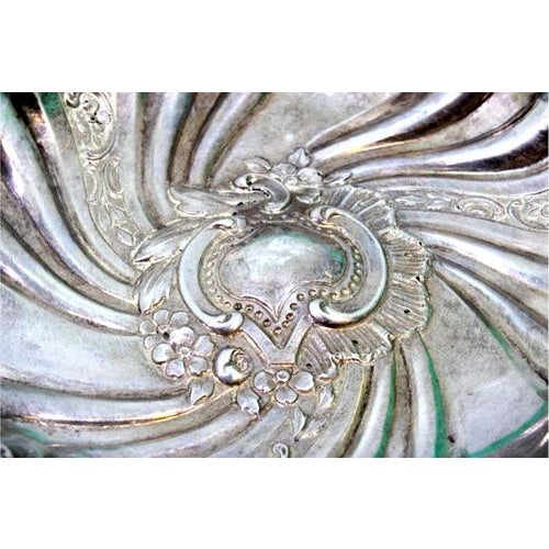 Silver Catchall with Reliefs, Shell Applications and Monogram Card, in Very Good conditions. Designed 1890 to 1919 This...