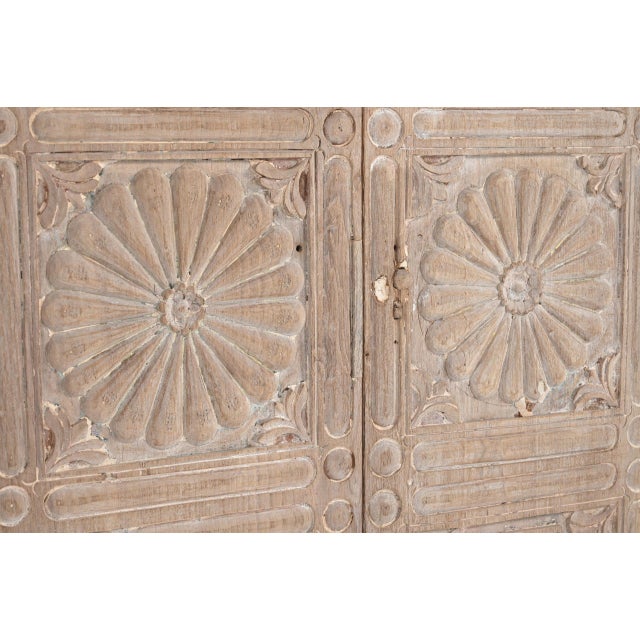 Vintage Indian Carved Teakwood Window Panel, two panels originally opening in the middle, sun bleached with a sunburst...
