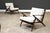 An original pair of mid century modern white fabric Z lounge chairs designed by Poul Jensen for Selig. Circa 1950’s....