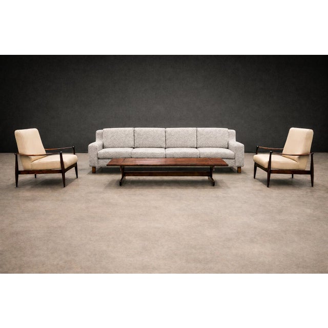 This elegant pair of “Canoa” armchairs was produced in Brazil during the 1960s by the Liceu de Artes e Ofícios, an...