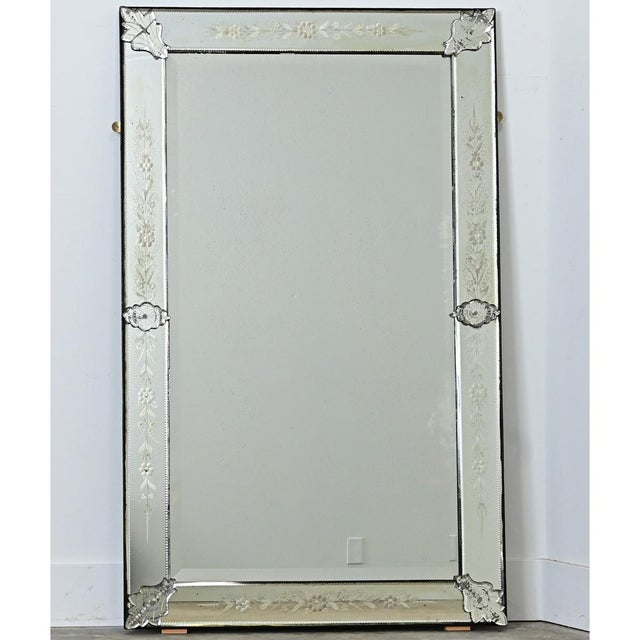 Italian Venetian style wall mirror, late 19th century, its multitude of glass elements composed in a thick wooden frame...