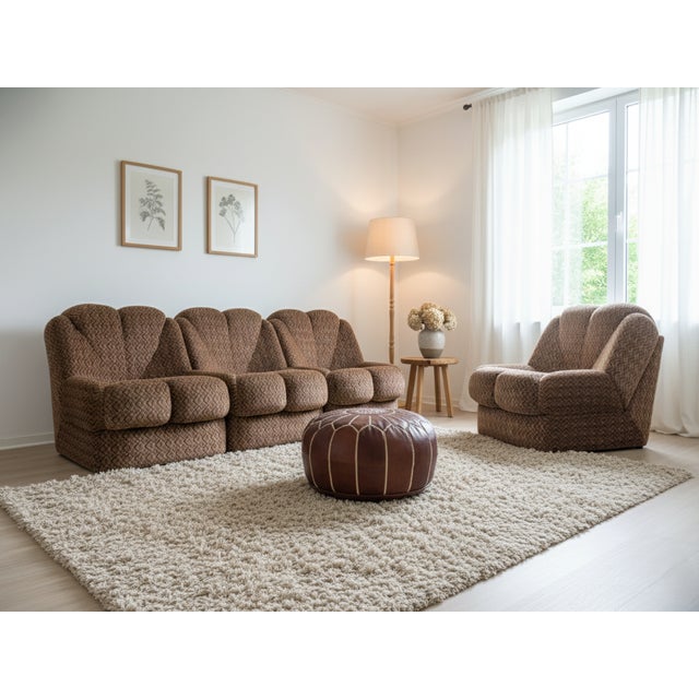 Elegant Italian modular sofa from the 1970s, composed of four individual lounge chairs that can be freely arranged to...