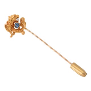 1960s 14k Yellow Gold Intricately Coiled Fish Brooch With Sapphire in His Mouth For Sale
