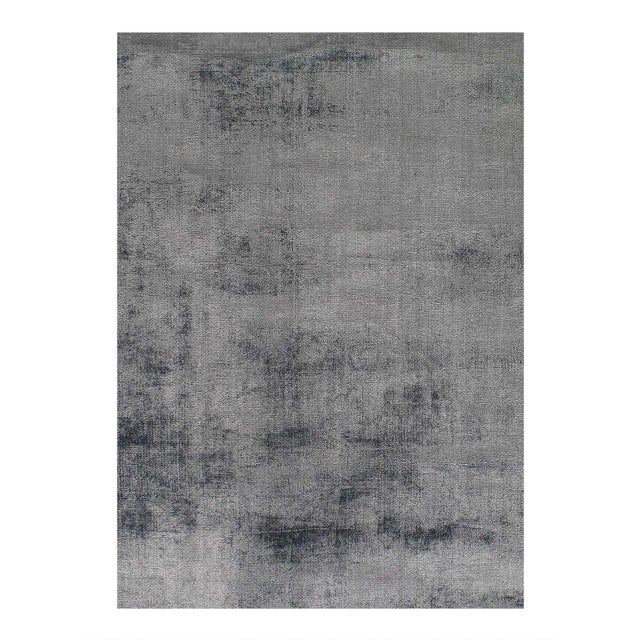 Enjoy the rich and luxurious feeling of bamboo silk underfoot with this area rug. The hand-knotted construction withstands...