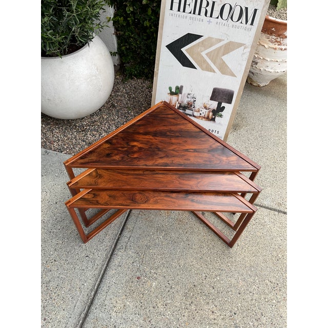 Rare set of 3 rosewood nesting tables designed by Kai Kristiansen for Vildbjerg Møbelfabrik, Denmark, circa 1960. Listed...