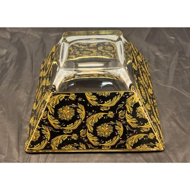 This vintage Murano art glass bowl from Italy features a striking black and gold floral design in a baroque and art...