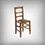 These traditional cherrywood chairs, crafted in the late 19th century, captivate with the warmth of their patina and the...