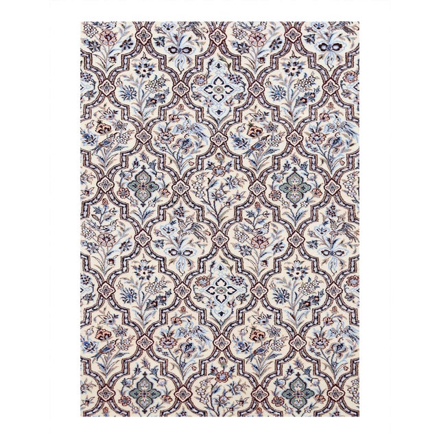Persian 6 Line Nain rugs are renowned for their detail and fine use of outlining along the central motifs. Breaking from...
