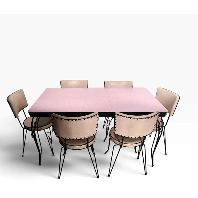 Exceptional 1950's Mid Century Kitchen, Dinette, Dining set consisting of six chairs, a table and a leaf. The table...