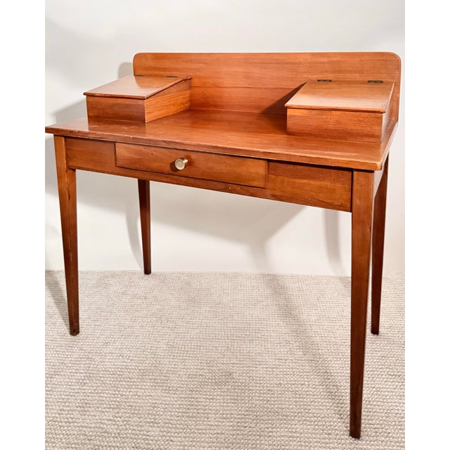 Compact writing desk by Lane, with clean lines and a warm cherry finish. A well-proportioned piece that works especially...