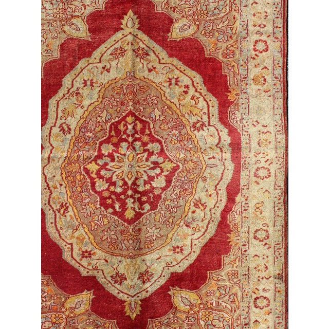 Measures: 4'7 x 6'5 Ornate Rich Red and Cream Antique Turkish Ladik Rug with Floral Medallion, Keivan Woven Arts / rug...