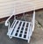 Vintage 1960s White Wrought Iron Cantilever Lounge Chair A striking example of mid-century modern design, this vintage...