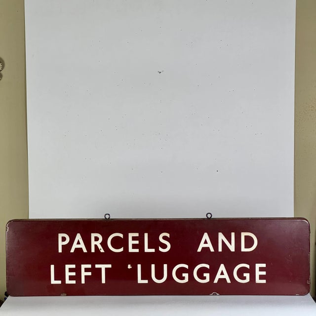 A rare early 20th Century large double sided train station sign in porcelain/Enamel. The white lettering against the deep...