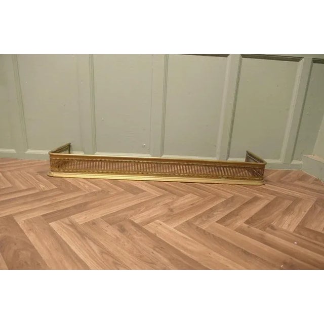 Very Long 19th Century Pierced Brass Fender This is a very superior quality Victorian Pierced Brass Fender and unusually...