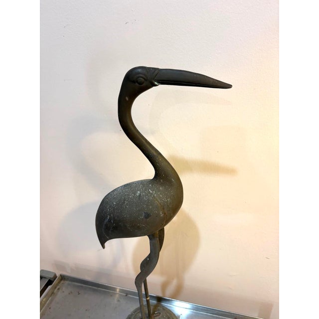 1960s-70s brass flamingo/crane statue. Some patina and discoloration marks as shown. Otherwise excellent condition.