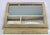 A lovely antique French keepsake box composed of wood with glass overlay and felt underside, circa 1920s. This is a...