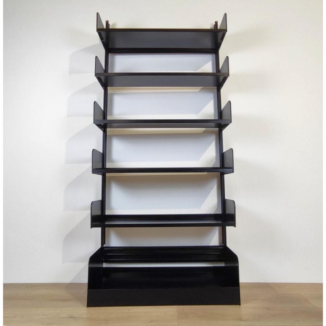 Congresso' bookcase with 6 shelves, made of black painted metal, manufactured by Lips Vago. Italy, mid-1970s. Condition:...