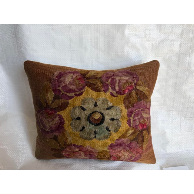 An elegant antique pillow created from a genuine 18th century French Aubusson tapestry fragment. The composition is...