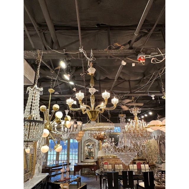 Modern Murano "tobacco" glass chandelier after Barovier. Featuring beautiful glistening deep gold colored glass and...