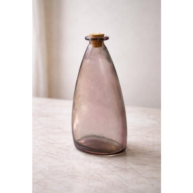 Handblown amethyst studio glass bottle sculpture with original cork — heavy, modern, sculptural, and beautifully organic....