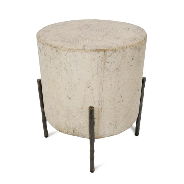 Modern round reclaimed pine wood side table on hand hammered iron base. Antiqued distressed white finish on wood. Each...