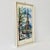 Rare mid-century lithograph of the Eiffel Tower in Paris painted by Arno in the 1960s. It is a framed print behind glass...