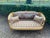 A magnificent 1940s French Louis XVI-style salon set, comprising one sofa and four matching armchairs. This elegant...