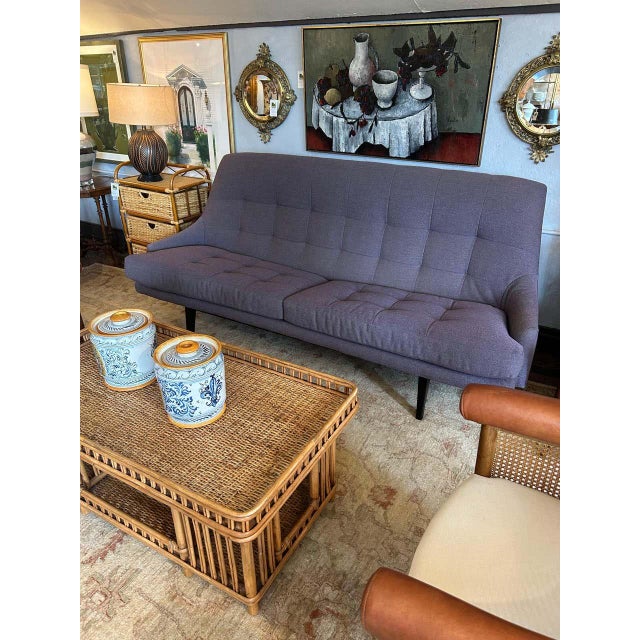 A rare find in this super stylish and very comfortable mid century modern Swedish sofa. The silhouette is sleek with high...