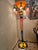 75 inches floor lamp made by wrought iron and Art glass shades with tube and bowls top top to button all lighted. Handmade...