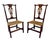 A beautiful pair of country Chippendale style chairs in mahogany, circa 1780. Each chair features a decorative pierced...