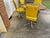 beautiful mid century set of vintage dining four chairs and table with chromes and yellow vinyls very unique
