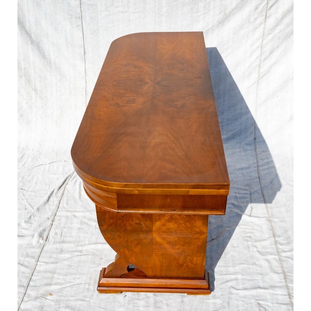 Here is an absolutely gorgeous and very unique Art Deco console table with a flip top. We have never seen one built quite...