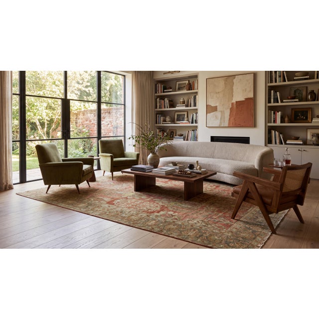 This exquisite Antique Malayer Rug features a richly textured terracotta and rust field adorned with an intricate, allover...