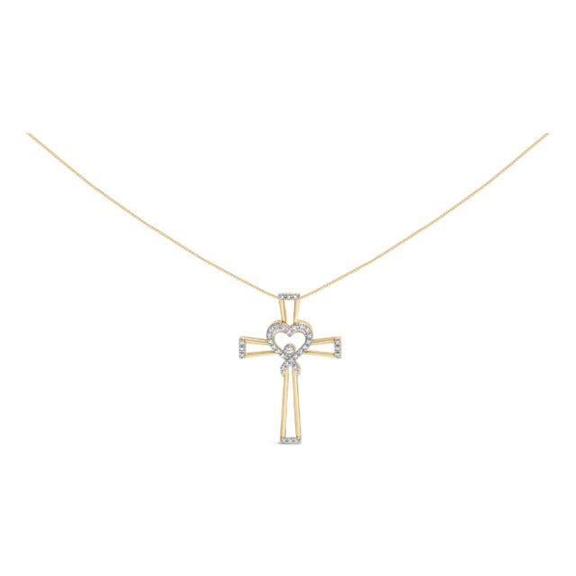 14K Yellow Gold Plated .925 Sterling Silver 1/6 Cttw Diamond Interlocking Heart and Ribbon Cross Pendant Necklace (H-I Color, I2-I3 Clarity) - 18" For Sale