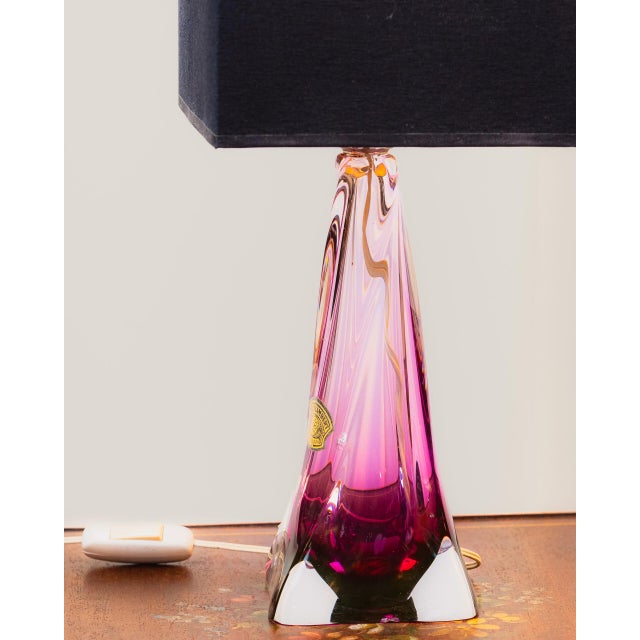 Val Saint Lambert pink glass table lamp. Handcrafted in Belgium in the 1960s. The twisted glass is hand-blown, displaying...