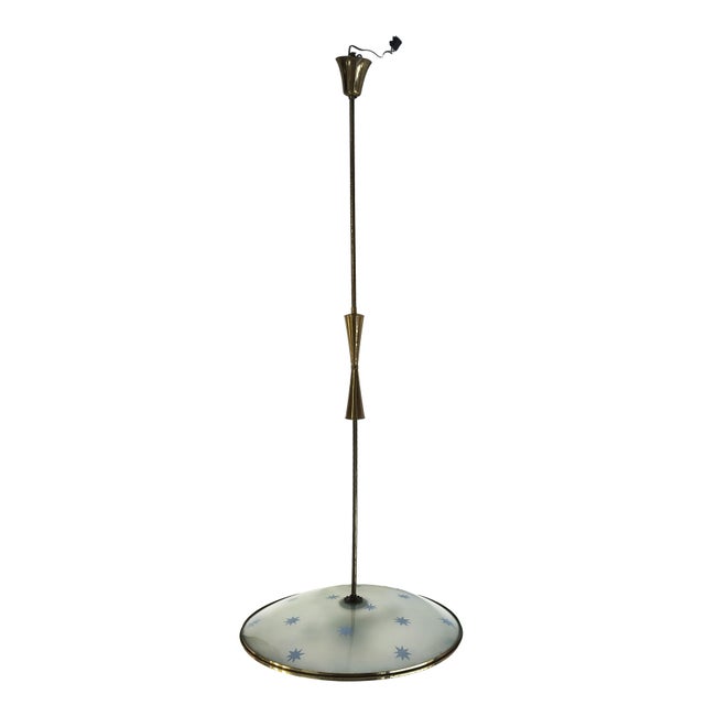 Pendant lamp attributed to Pietro Chiesa for Fontana Arte, 1940s. Gilded brass shank, rod, and supports, with a ground...