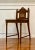 French Louis XVI style caned seat and back carved oak vanity chair. Charming chair beautifully carved with central...