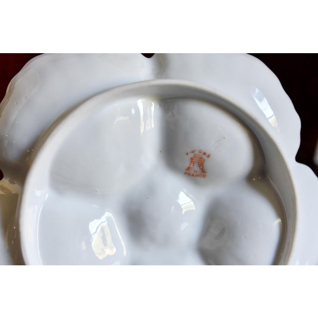 A late 19th/early 20th century French Limoges oyster plate manufactured by Tressemann & Vogt, retailed through the Boston...