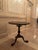 • Authentic Stickley • Dark mahogany, rich ebonized finish • Scalloped pie-crust edge top • Removable top • Birdcage...