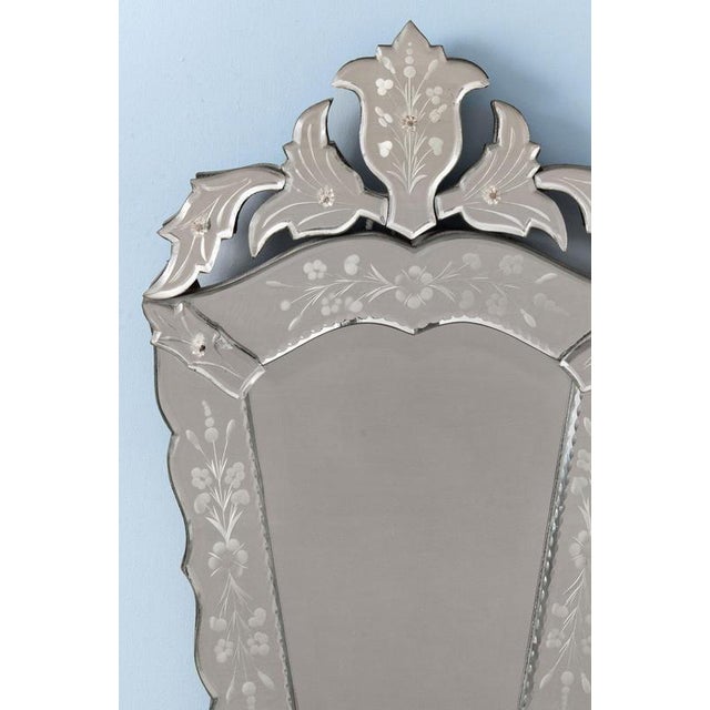 Height: 67 cm Width: 39 cm Light wear throughout. The lower left corner foliate part is restored. A loss to the glass bead...