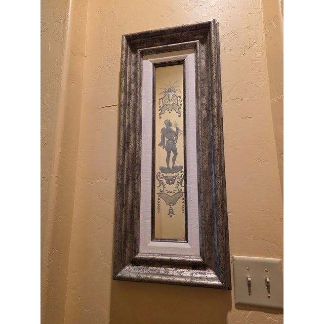 Wonderful antique reverse etched Italian mirror panel in 20th century custom silver leaf frame.