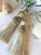 A pair of vintage style key tassels for custom drawers, cupboards, etc. Handmade beaded key tassels in light neutral...