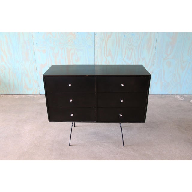 An early piece from Paul Mccobb for Winchedon Modern. The cabinet features 6 drawers on a rare form iron base. These...