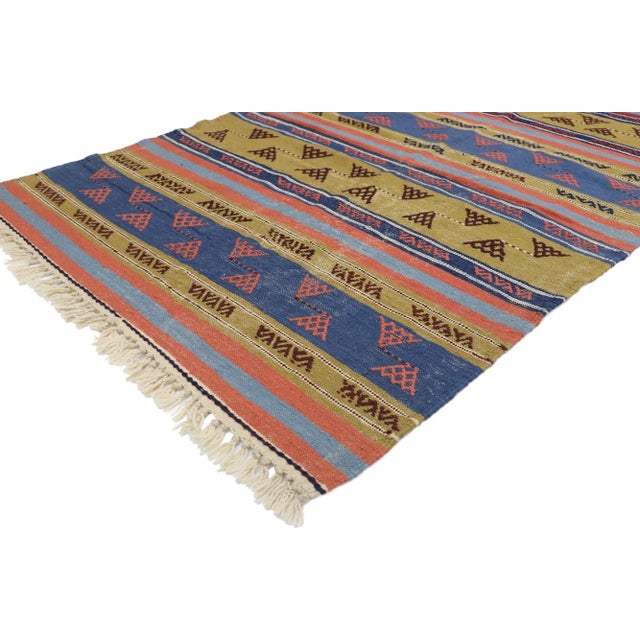 Distressed Vintage Persian Shiraz Kilim Rug with Rustic Tribal Style 04'03 x 06'02. Full of tiny details and a bold...